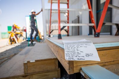 A to-do list sits on the back deck during construction.