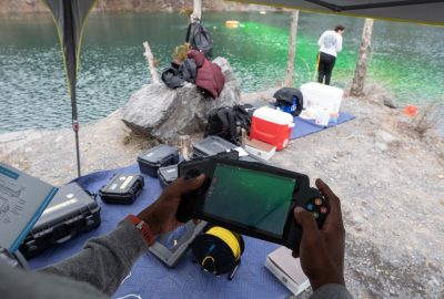 Dye tracking research at the quarry pond. Photo credit Peter Means 