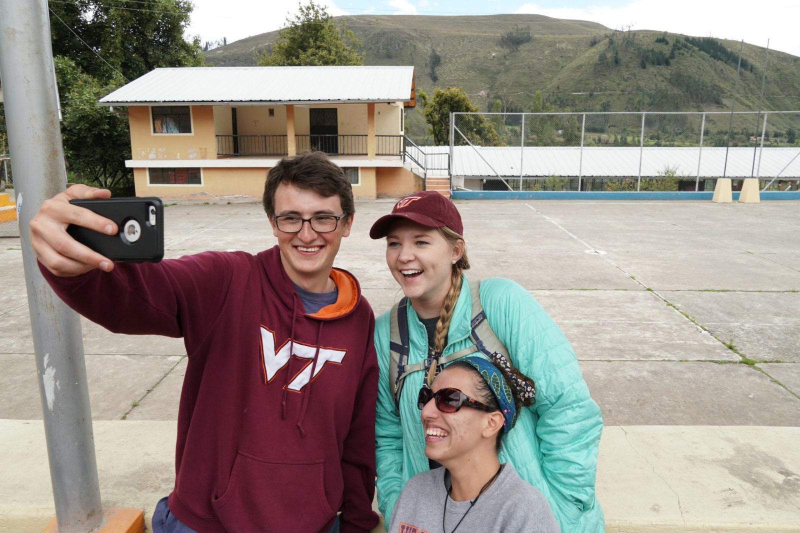Students smile in Ecuador.