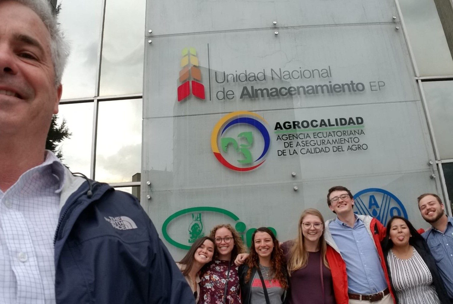 The first Ecuador research internship cohort stands by the Ecuadorian Ministry of Agriculture.