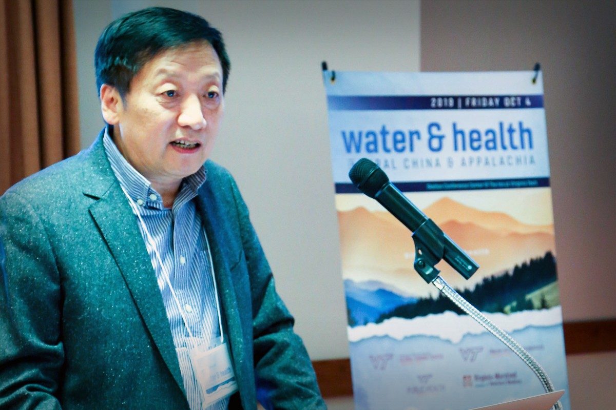 Tao Yong presenting at the Water and Health Conference