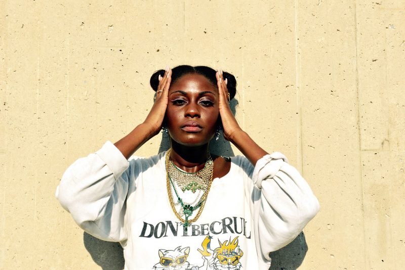Sammus standing in front of a wall