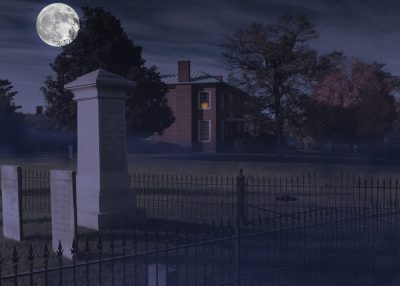 A photo illustration shows the Reynolds family graveyard at night in the foreground as a full moon rises over the darkened house
