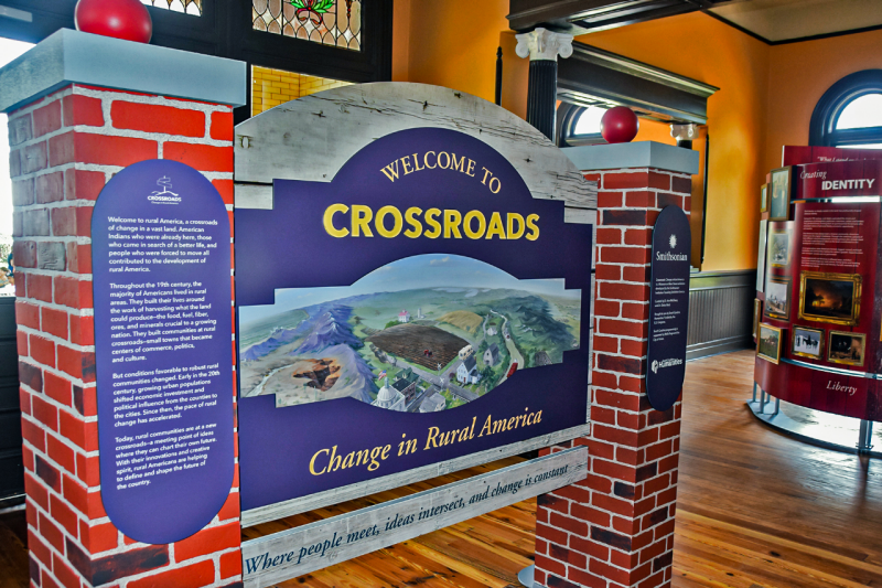 A display welcoming visitors to the "Crossroads: Change in Rural America" exhibit