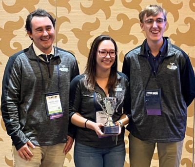 Pierre-Anne Laird ’22, Sabina Holz, and Noah Stallard brought home the 2022 American College of Sports Medicine Student Bowl trophy.