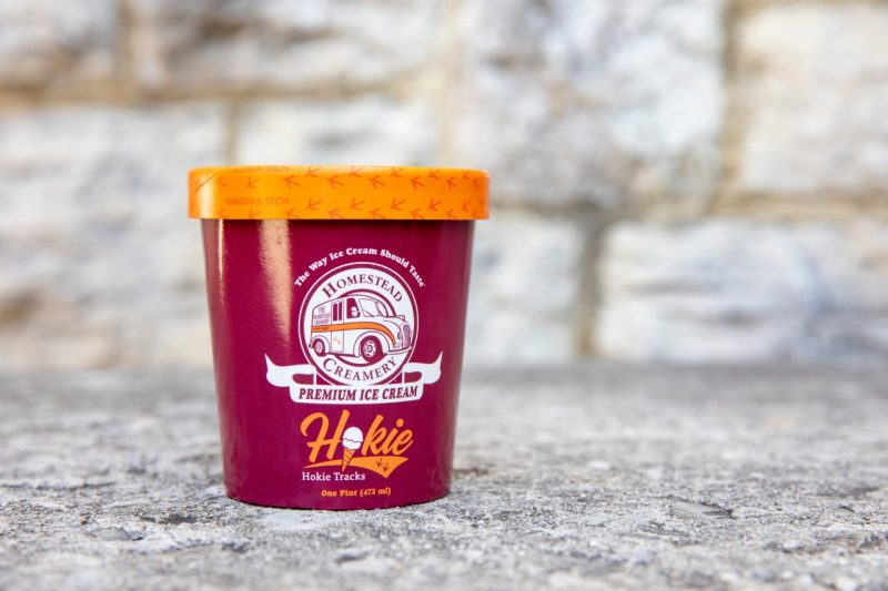 A pint container of Hokie Tracks in front of a Hokie stone background