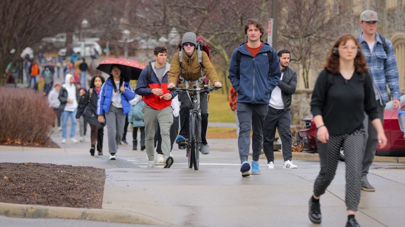 Students make their way across campus on the first day of the 2023 spring semester.
