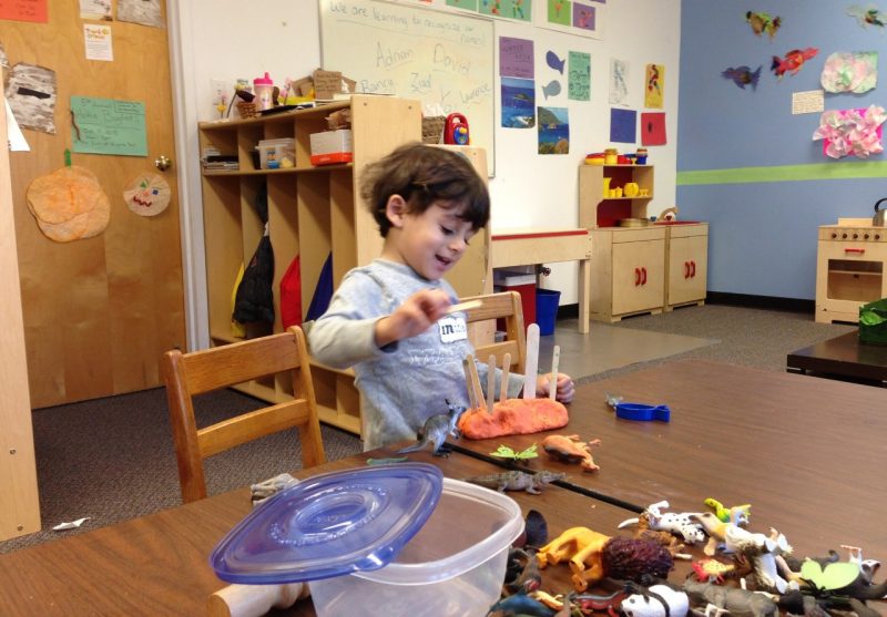 A child plays at the Little Hokies Hangout Playgroup