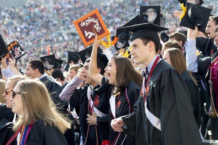 Students celebrate at spring commencement.
