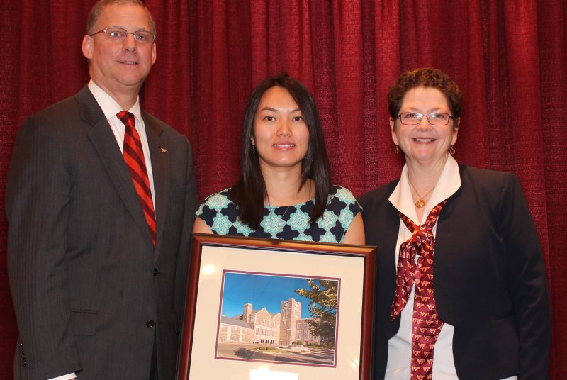From left: College of Agriculture and Life Sciences Dean Alan Grant, Anh Tran, and Associate Vice President of the Virginia Tech Alumni Association Debbie Day