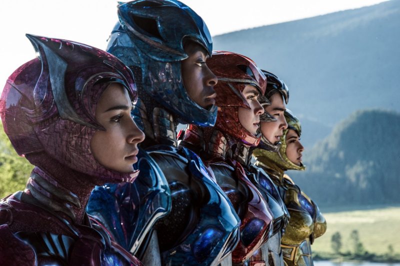 A publicity still from the upcoming 'Power Rangers' movie shows five people dressed in battle-type suits.