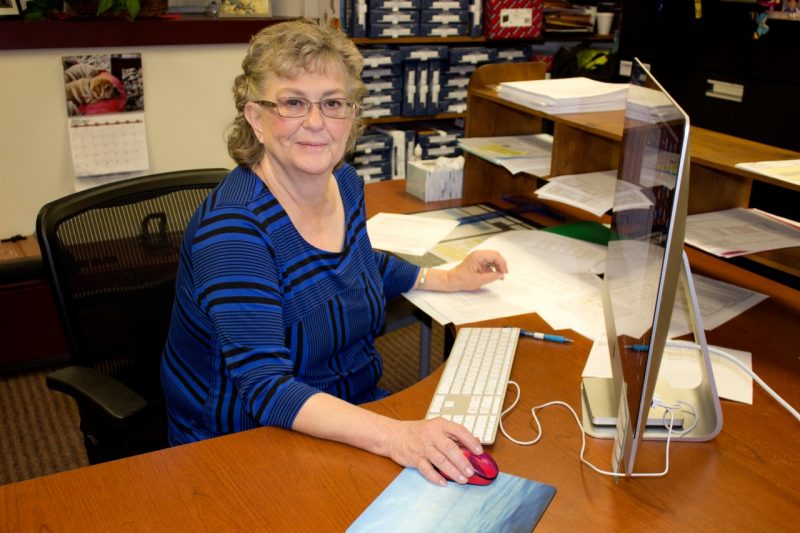 Vickie Martin at her desk
