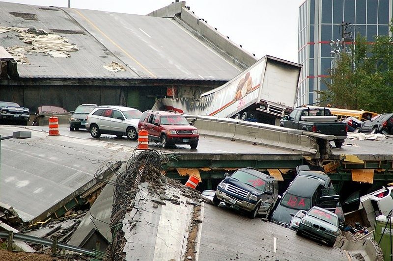 Vehicles resting on the collapsed portion of I-35W Mississippi River bridge, after the August 1st, 2007 collapse.