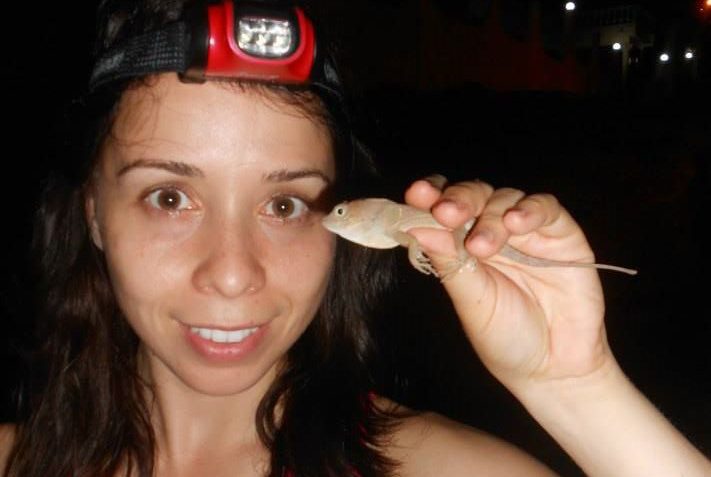 Martha Munoz holds a lizard
