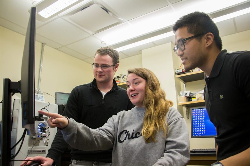 Will Stone, Cat Hayes and Duke Nguyen review data from the mass spectrometer.