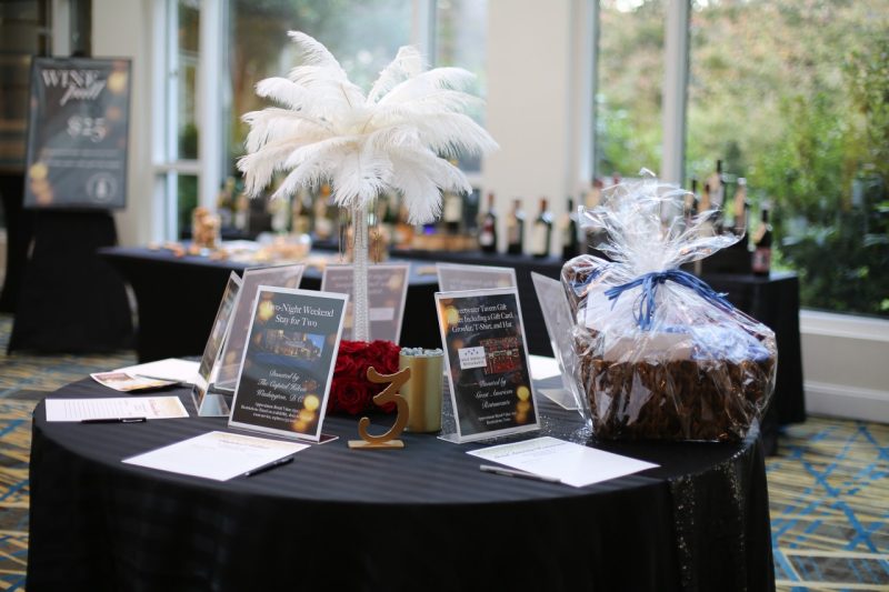 Displayed on a table are some of the items up for bid at the gala’s silent auction.