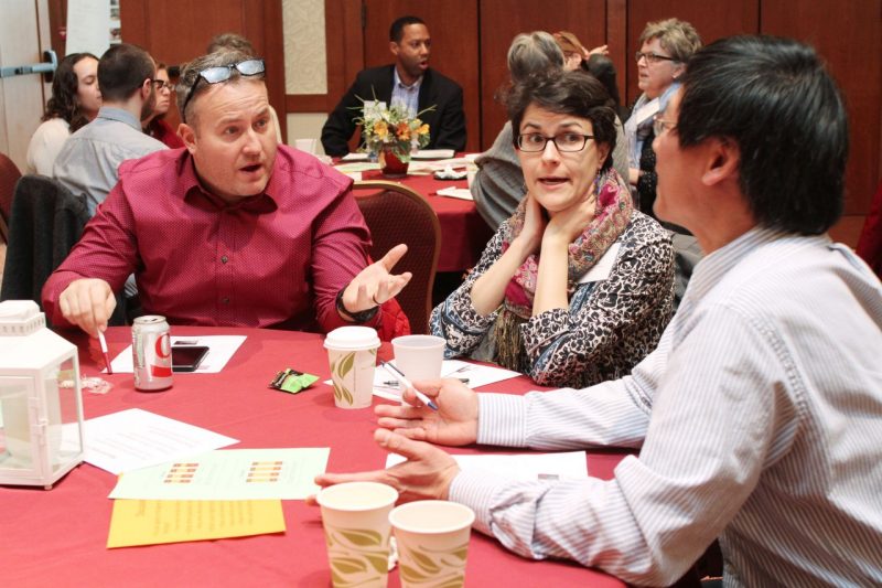 Attendees of the annual  workshop discuss a facet of diversity.