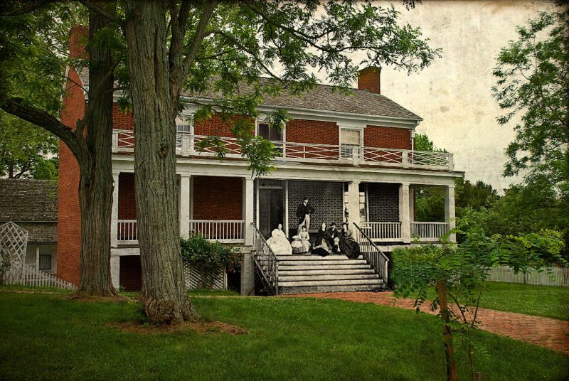 A contemporary shot of the McLean House, the site of General Robert E. Lee's surrender at Appomattox Court House, overlays a photograph of the McLean family sitting on their porch soon after the Civil War ended.