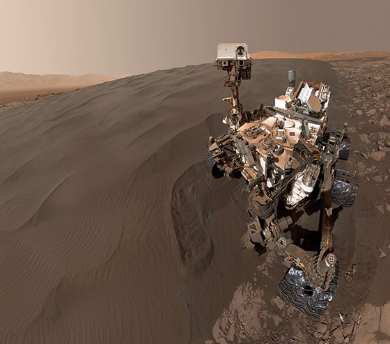 Mars rover Curiosity self portrait on sand dune.