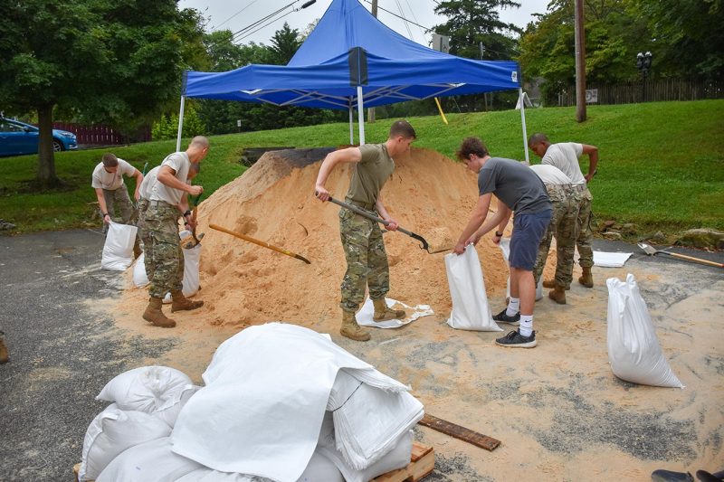 Students fill sandbags
