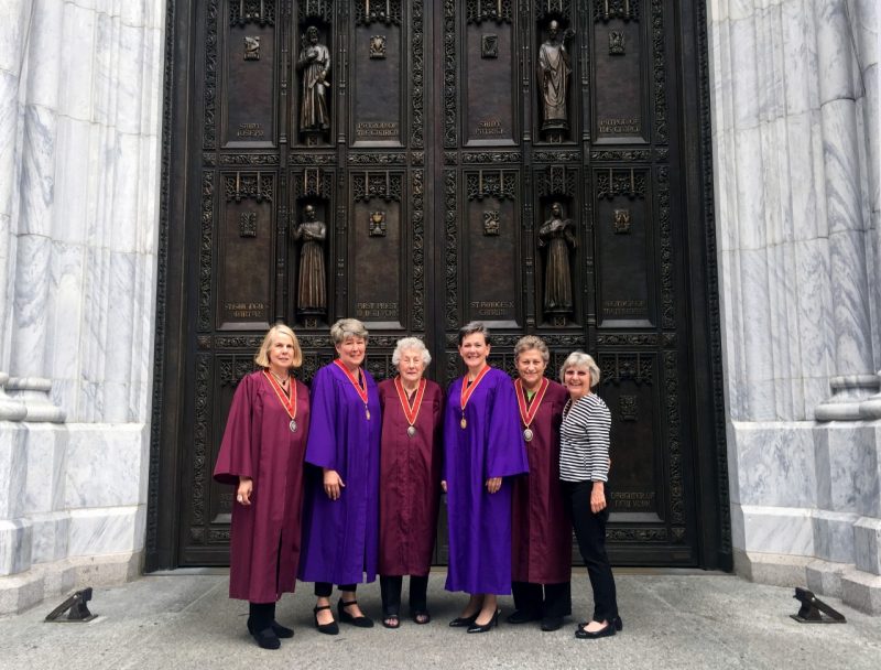 A gathering of the first women leaders of the AIA – AIA presidents and chancellors of the AIA College of Fellows – on the steps of St Patrick's Cathedral in New York City during the 2018 conference of the AIA. Left to right: Lenore Lucey, Katherine Schwennsen, L. Jane Hastings, Helene Combs Dreiling, Betsey Olenick Dougherty, and Donna Dunay.
