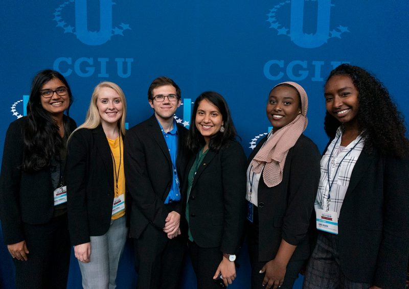 A group of six students attending the Clinton Global Initiative University