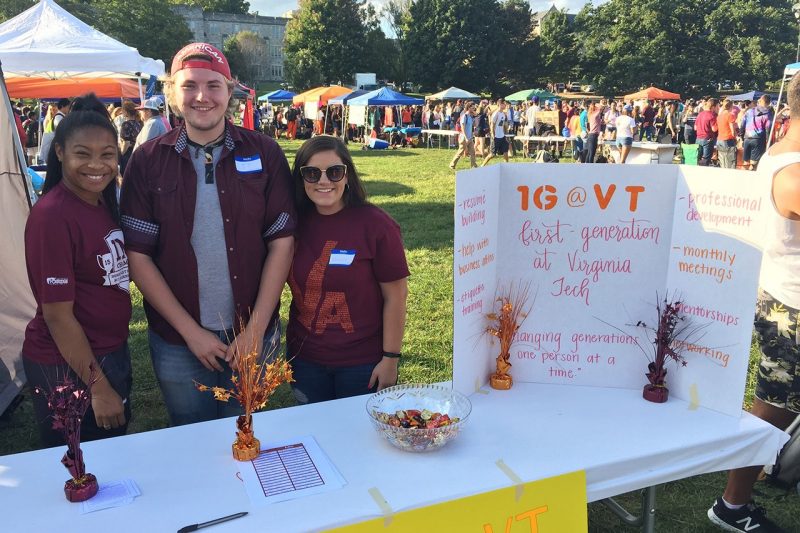 Members of the 1st Generation at Virginia Tech club stand at their table during Gobblerfest. 