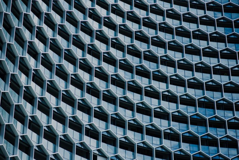 picture of a building with many honeycomb windows