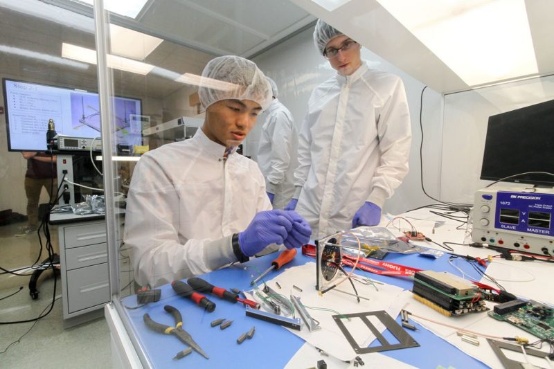 Students work on manufacturing and assembly of Virginia Tech’s CubeSat satellite at Space@VT.