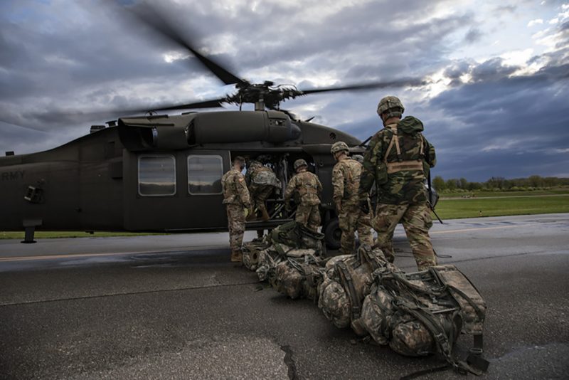 Cadets board a helicopter.