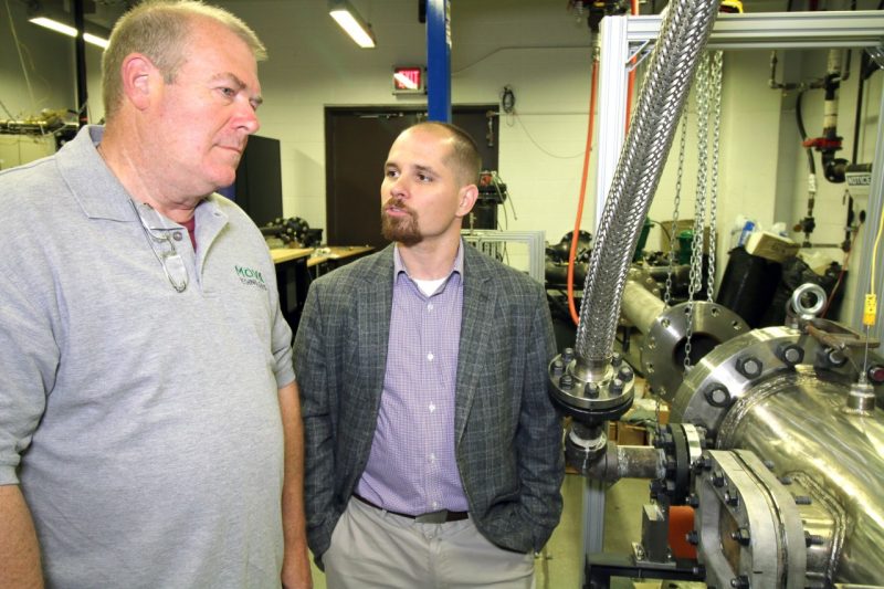 Steve Critchfield, CEO and President of MOVA Technologies, meets with Joseph Meadows, assistant professor of mechanical engineering
