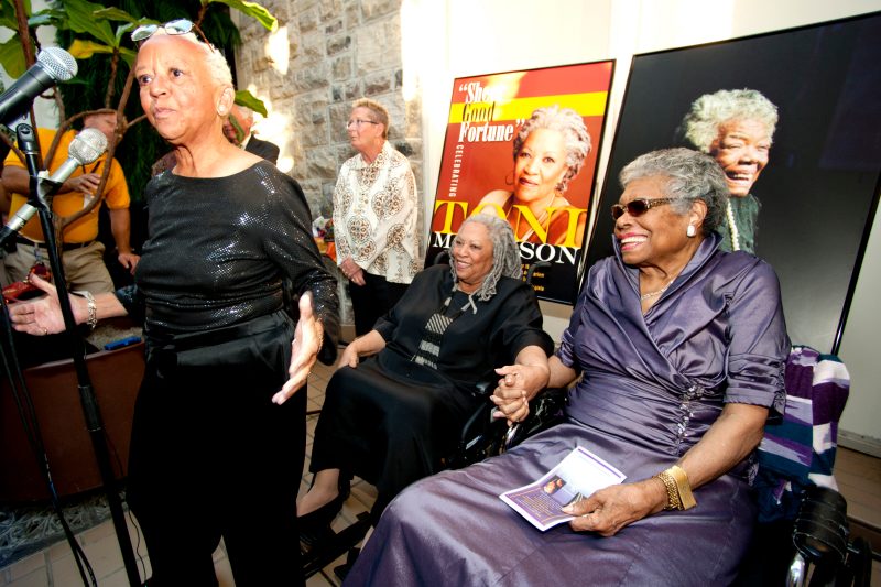 Nikki Giovanni speaks to a crowd during “Sheer Good Fortune,” a celebration of Toni Morrison at Virginia Tech in 2012. Sitting behind her are Morrison and Maya Angelou (right).