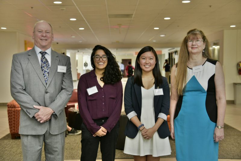 Computer science alumni Dean and Nora Kirstein, longtime champions and donors of the Anne and George Gorsline Endowed Scholarship in Computer Science, share a moment with seniors Ankita Khera, left, and Cynthia Zhang, current recipients of the scholarship.