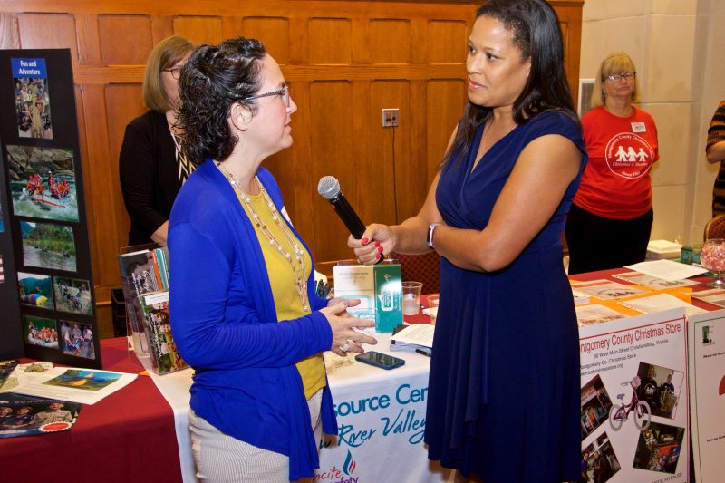 Photo of Dawn Jefferies interviewing Laura Beth Weaver, assistant director of the Women’s Resource Center, at the 2019 CVC kickoff.