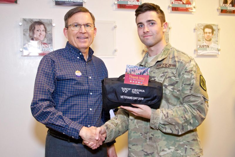 Cadet Bryce Cook delivered gift to Keith Gay.