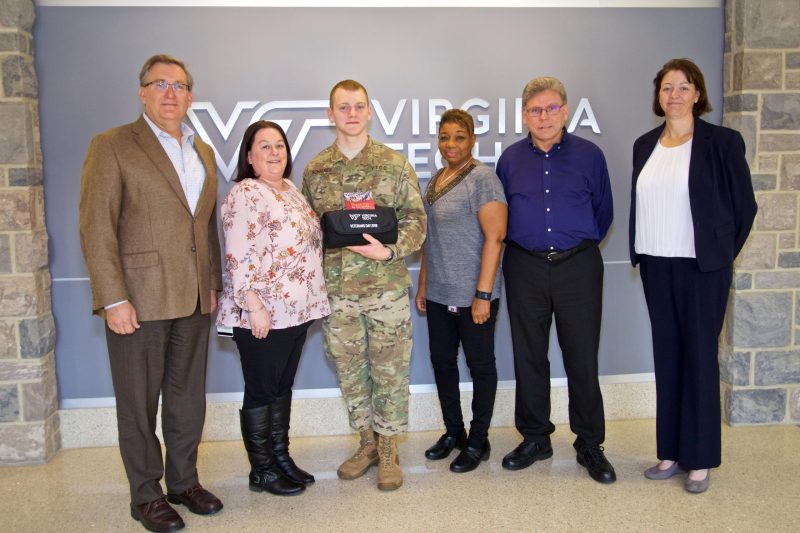 Cadet Thomas Luke Schauber delivered gifts to employees.