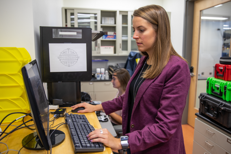 Grace Wusk, doctoral student in biomedical engineering and mechanics, works on research in Gabler's research lab