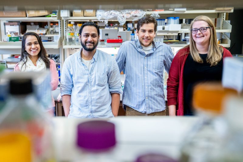 Big Lick of Science creators (from left) Rachana Deven Somaiya, Paras Patel, Jeremy Myslowski, and Carleigh Studtmann pose for a photo in a lab