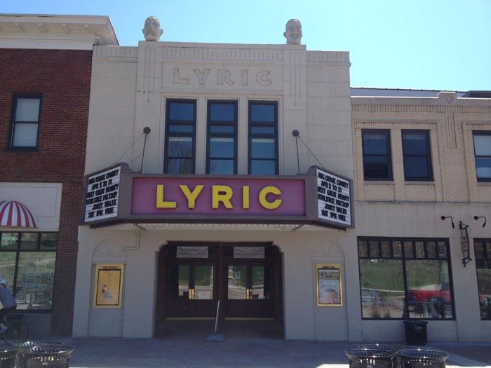 A photo shows the front of the Lyric Theatre