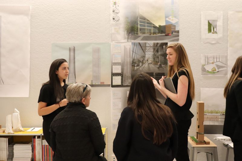 Chicago Studio students Toufa Kinani (left) and Chloe Fanelty present their design during the final critique of the fall 2018 semester.