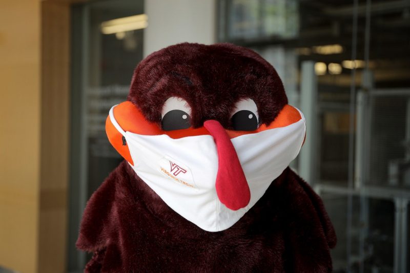 Portrait of the Hokiebird wearing a Virginia Tech branded mask 