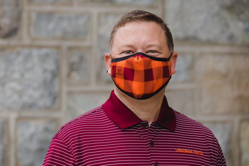 Frank Shushok, Vice President for Student Affairs, wearing face covering in Hokie colors.
