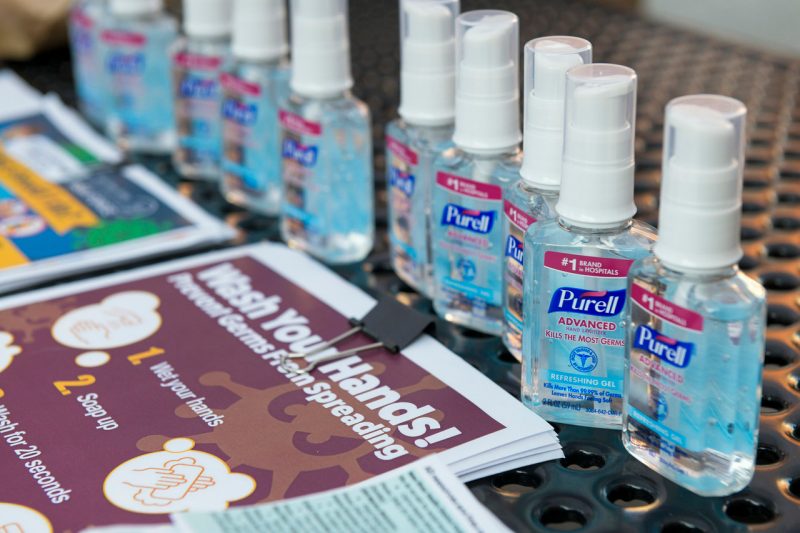 Picture of hand sanitzer bottles and posters.