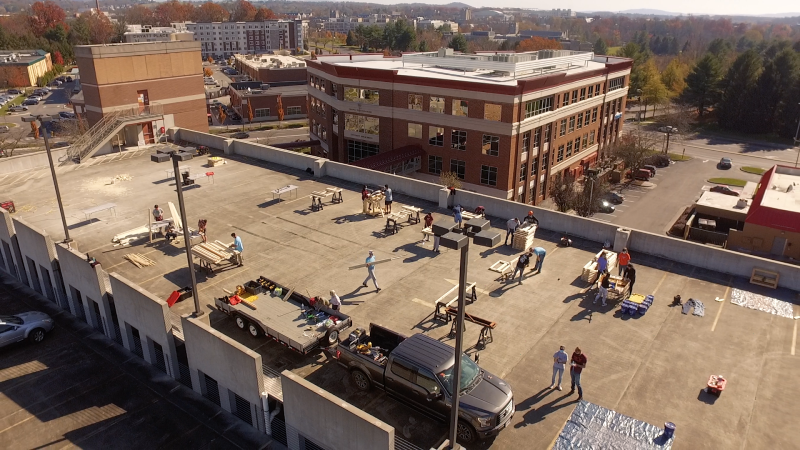 Arial view of the top deck of parking garage