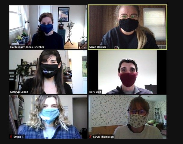 Image of six students wearing face masks while discussing their work during a Zoom meeting