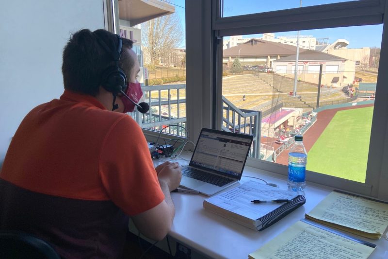 Senior Evan Hughes, who last year placed second among collegiate broadcasters nationally in the Sportscasters Talent Agency of America (STAA) All-American, prepares for his radio broadcast of Virginia Tech baseball against North Carolina on the Virginia Tech Sports Network from Learfield IMG College.