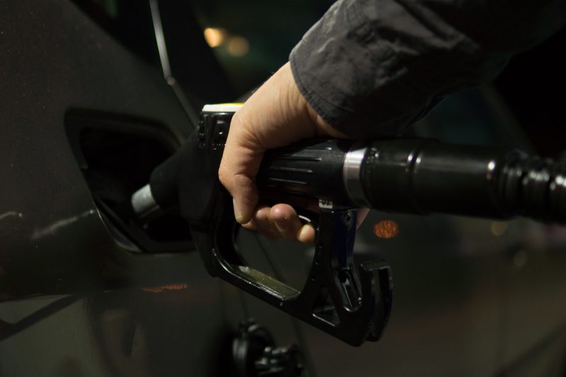 image of driver pumping gasoline into car 