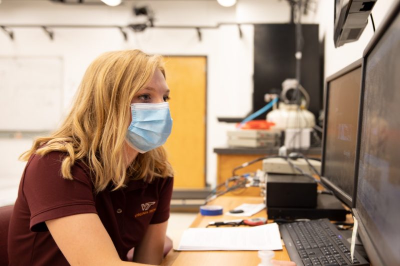 Caitlin Bowman analyzes data gathered from walking - or tripping - in the Madigan Biomechanics Lab.