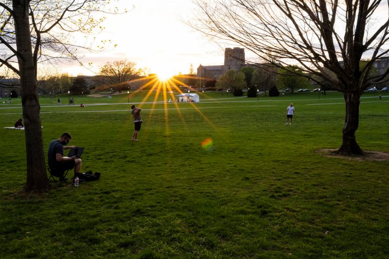 Image shows activity on the drillfield as a spring day comes to an end. 