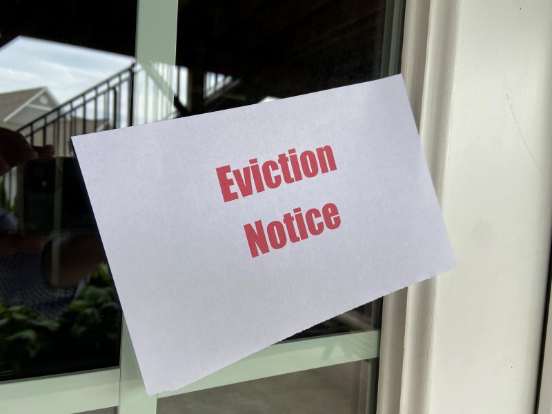 image of an eviction notice posted on a door 